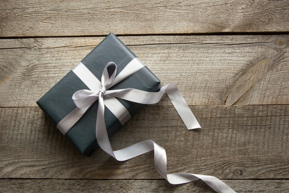 A gift-wrapped gift-card-sized box