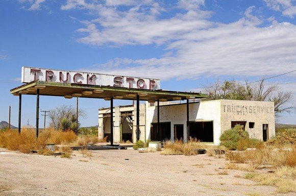 An abandoned, rundown truck stop. 
