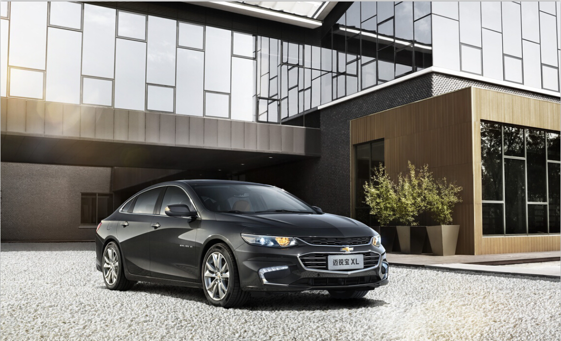 A Chevrolet Malibu XL, a midsize sedan, with Chinese license plates.