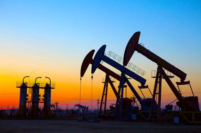 An oil pumping unit at sunset.