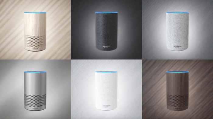 Six different Amazon Echo speakers, each with a different exterior material. 