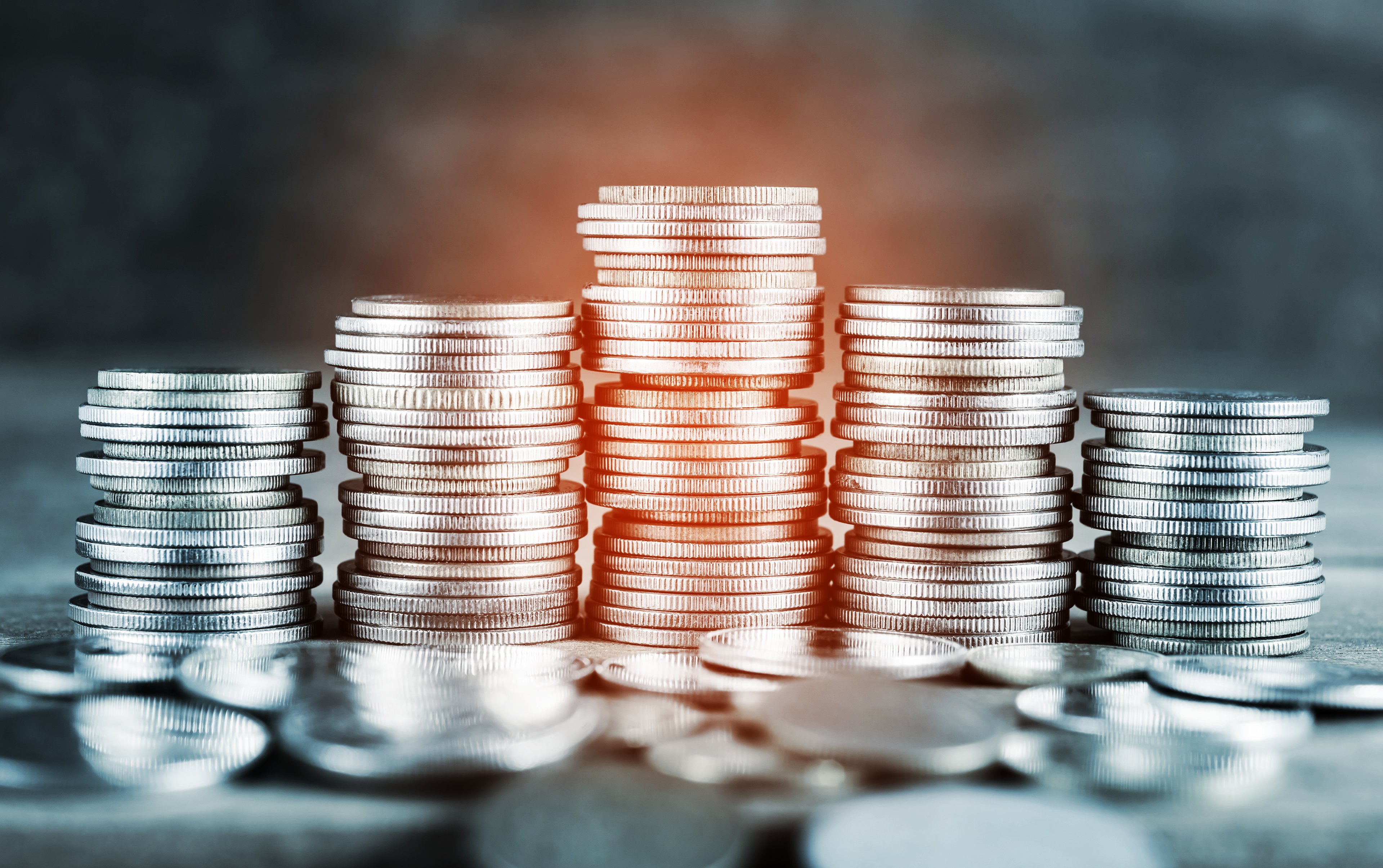Stack of coins growing to a middle-stack apex.