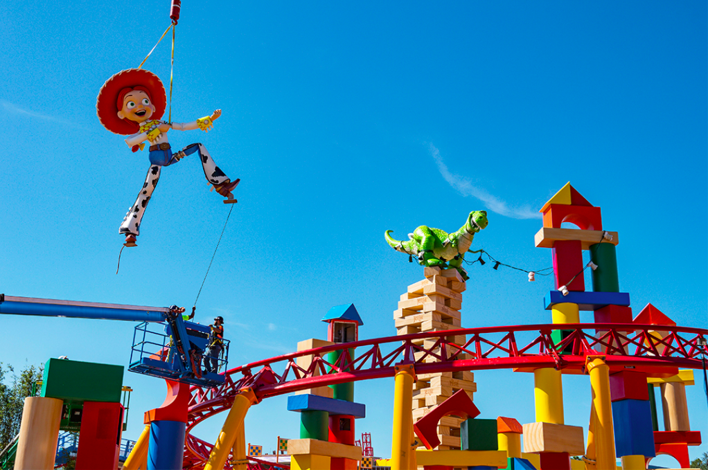 Jessie statue gets lowered by a crane into Toy Story Land opening in the summer of 2018 in Disney World.