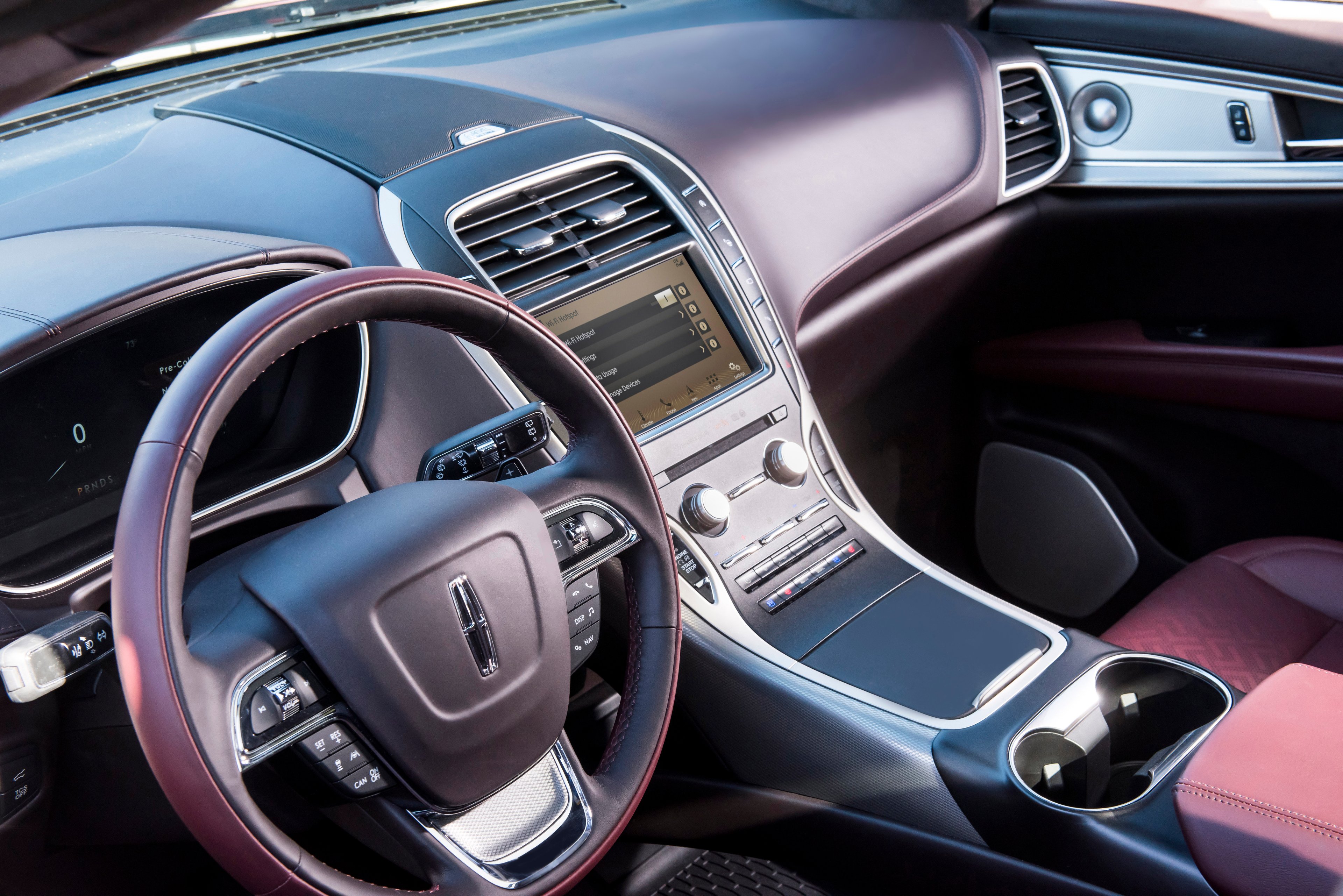 A view of the front seat and dashboard of a Lincoln Nautilus. 