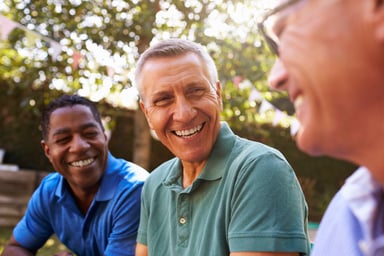 smiling middle-aged men_GettyImages-643324626
