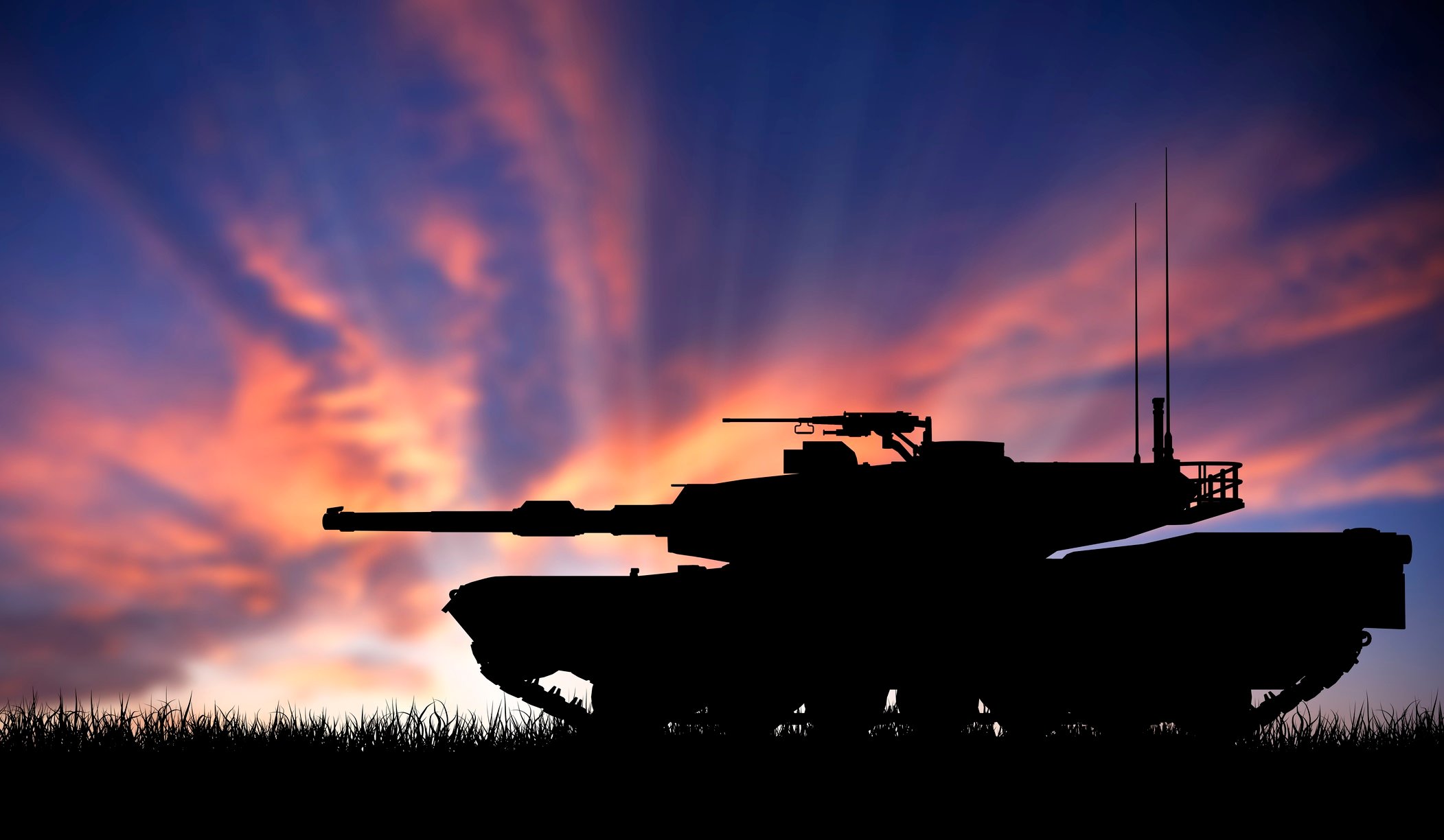 Tank in front of a sunset