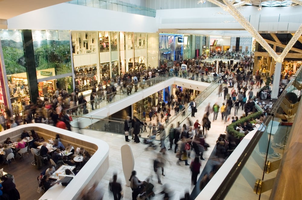 People shopping in a crowded mall