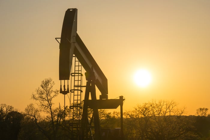 Oil rig at sunrise