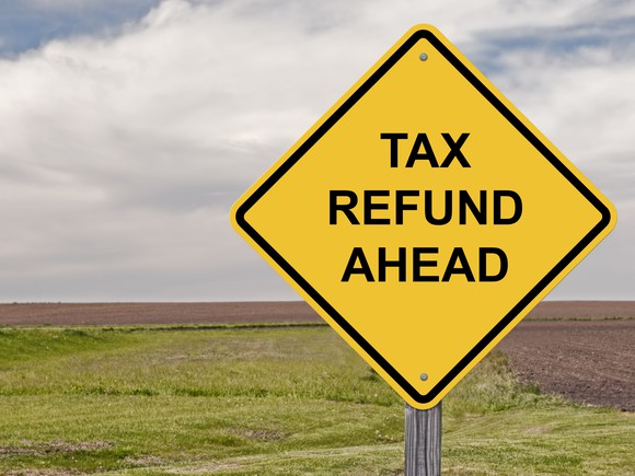 Tax Refund Ahead diamond-shaped road sign