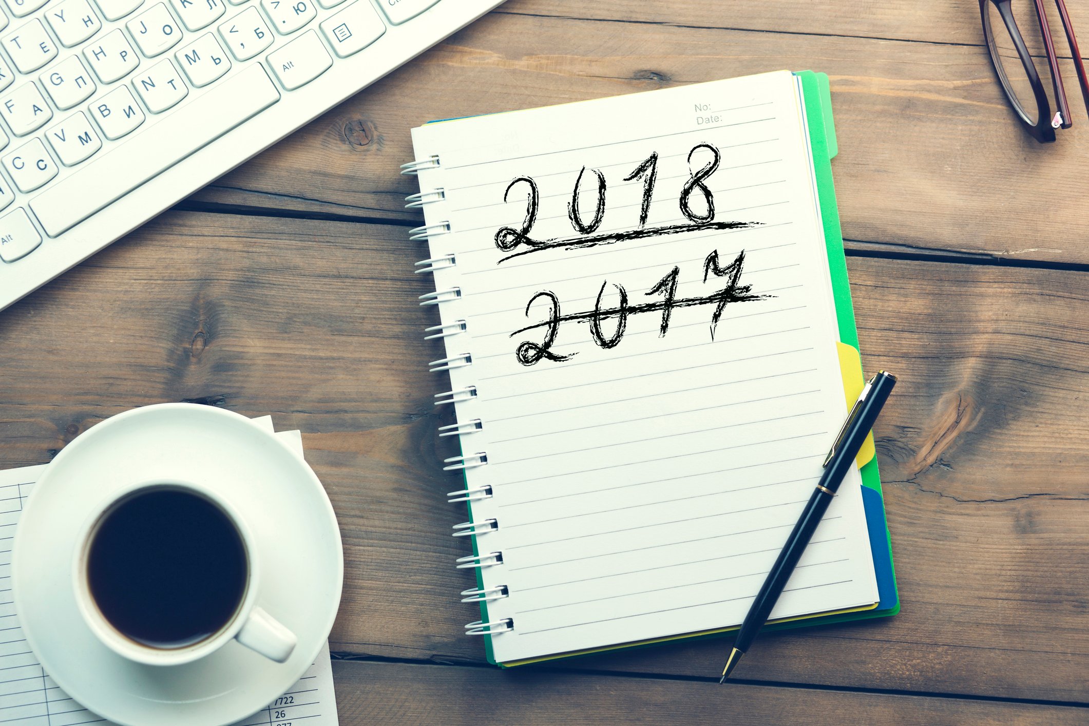 2017 scratched out on notepad with 2018 underlined