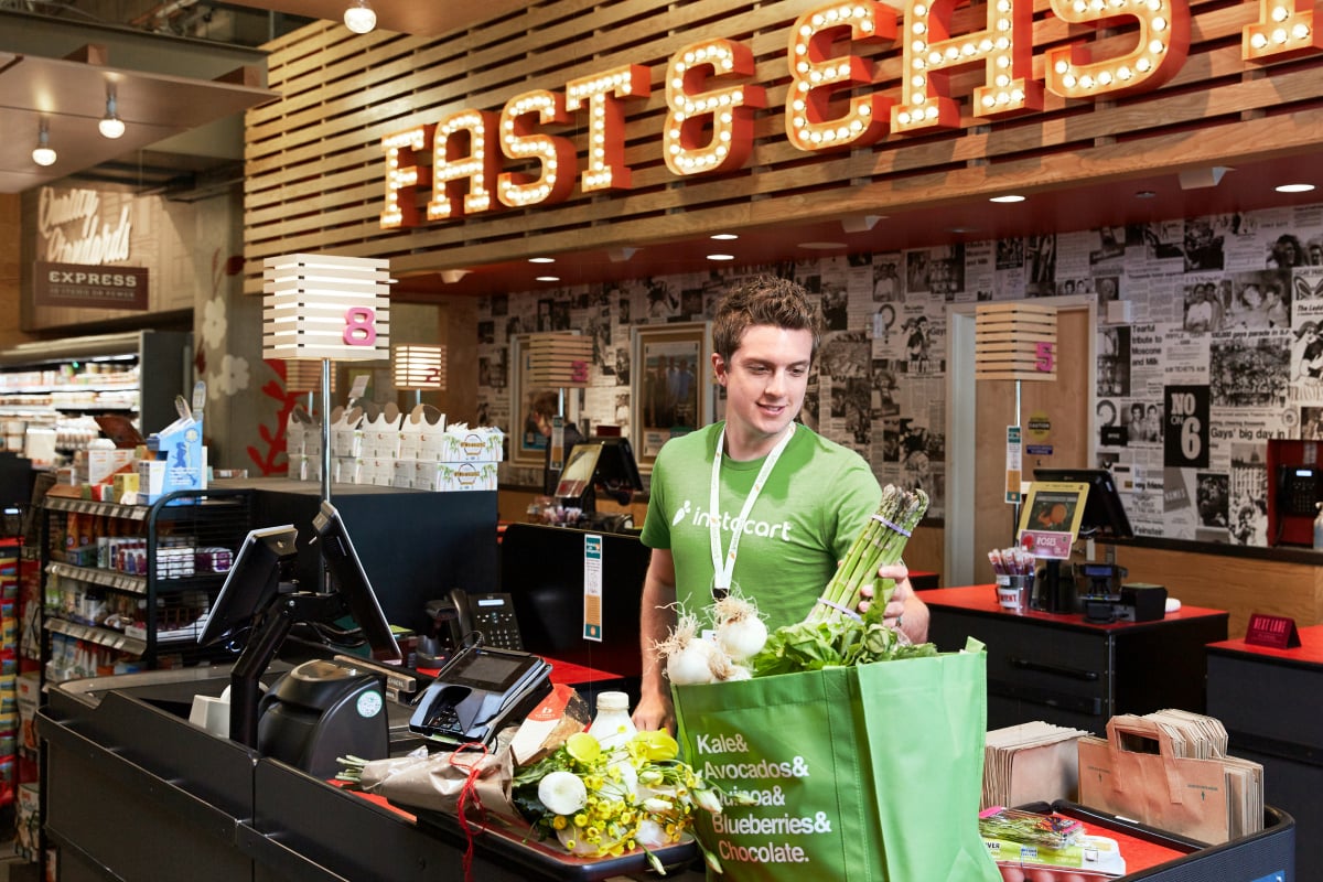 An Instacart personal shopper checks out.