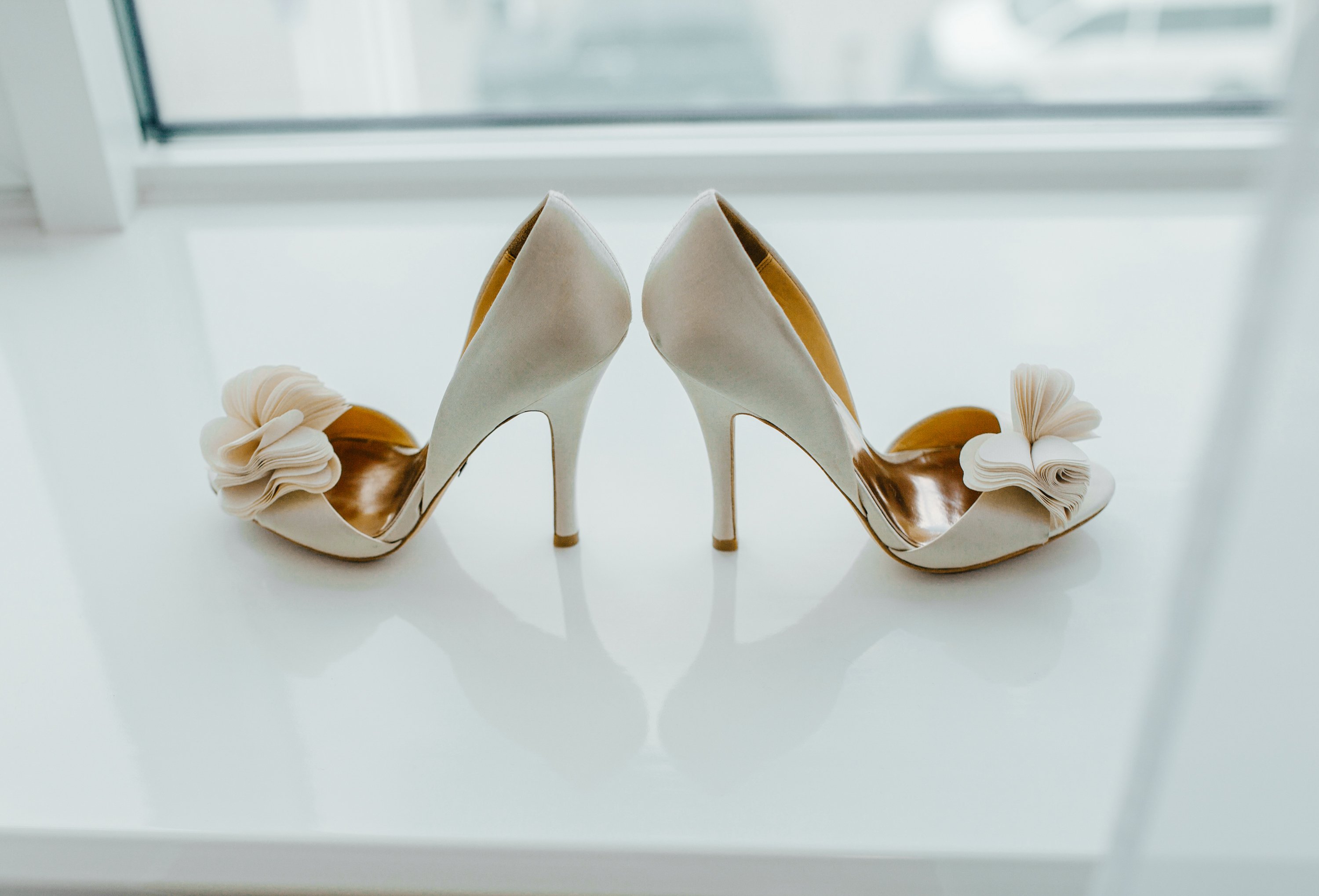 A pair of high heels is displayed.