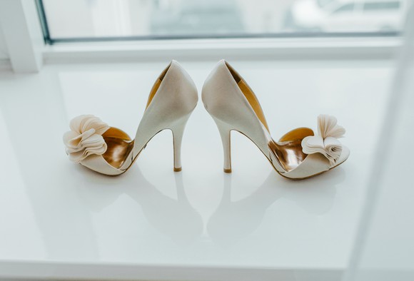 A pair of high heels is displayed.
