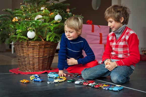 Two kids playing car games