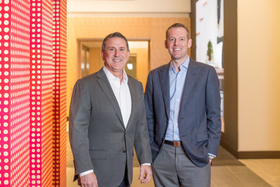 Target CEO Brian Cornell and Shipt CEO Bill Smith standing together in a hallway.