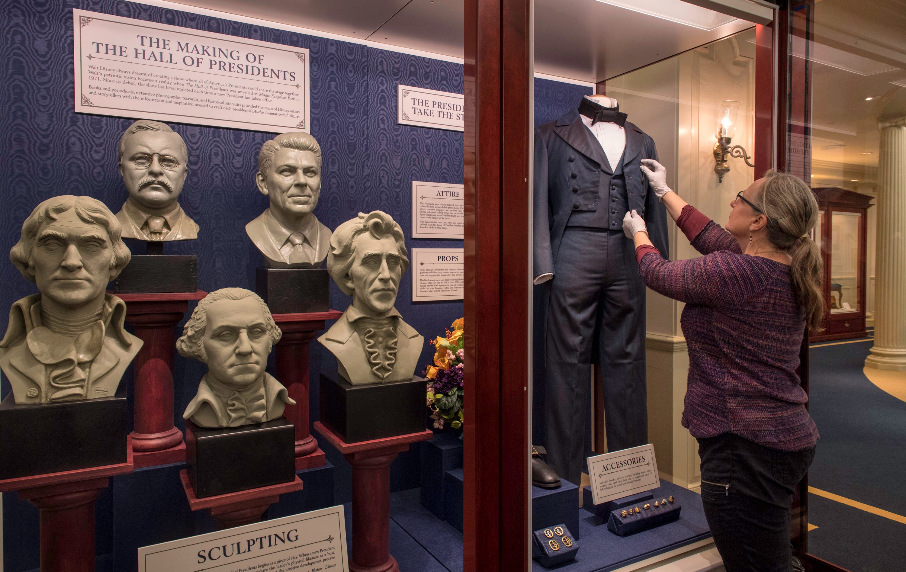 An exhibit outside of The Hall of President's theater detailing the history of the attraction.