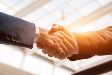 Business people shaking hands