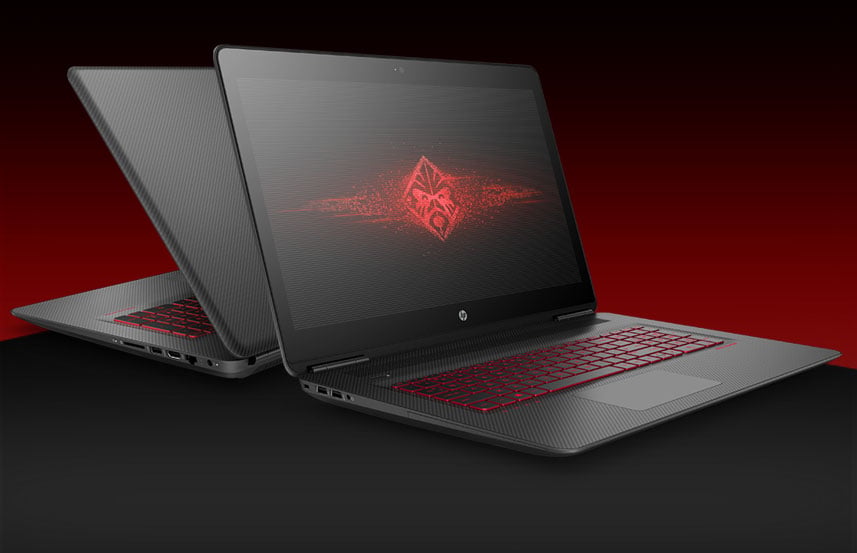 Two open HP OMEN laptops back to back on a table.