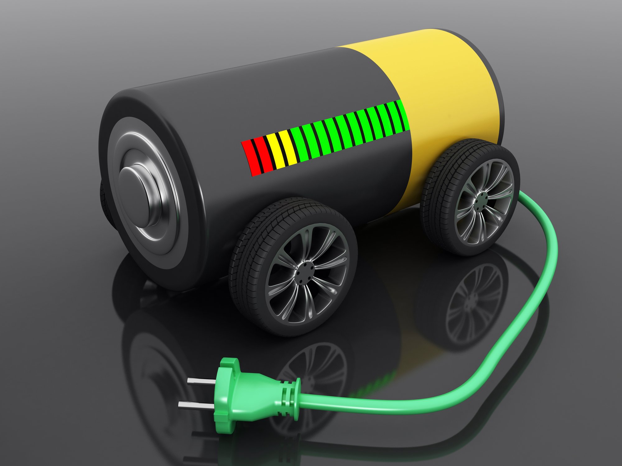 A battery on wheels, with a green plug protruding from it and a charging bar that's mostly green.