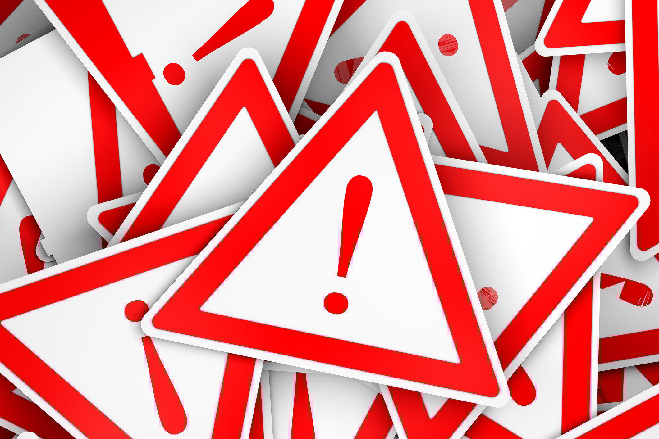 A pile of danger signs: white triangles outlined in red with an exclamation mark in the middle.