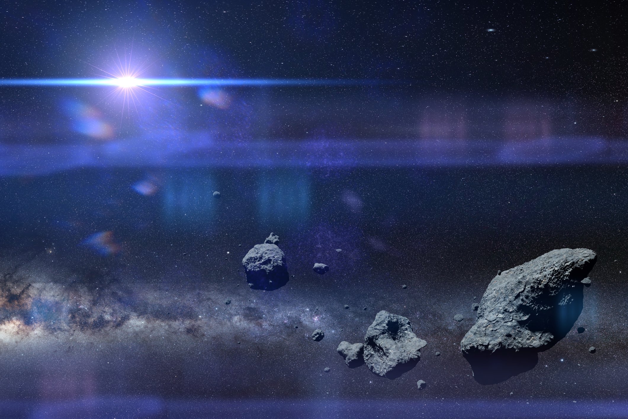 Asteroids against background of space