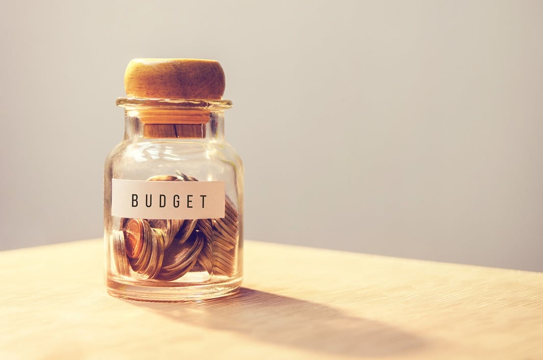 Coin jar labeled "budget"