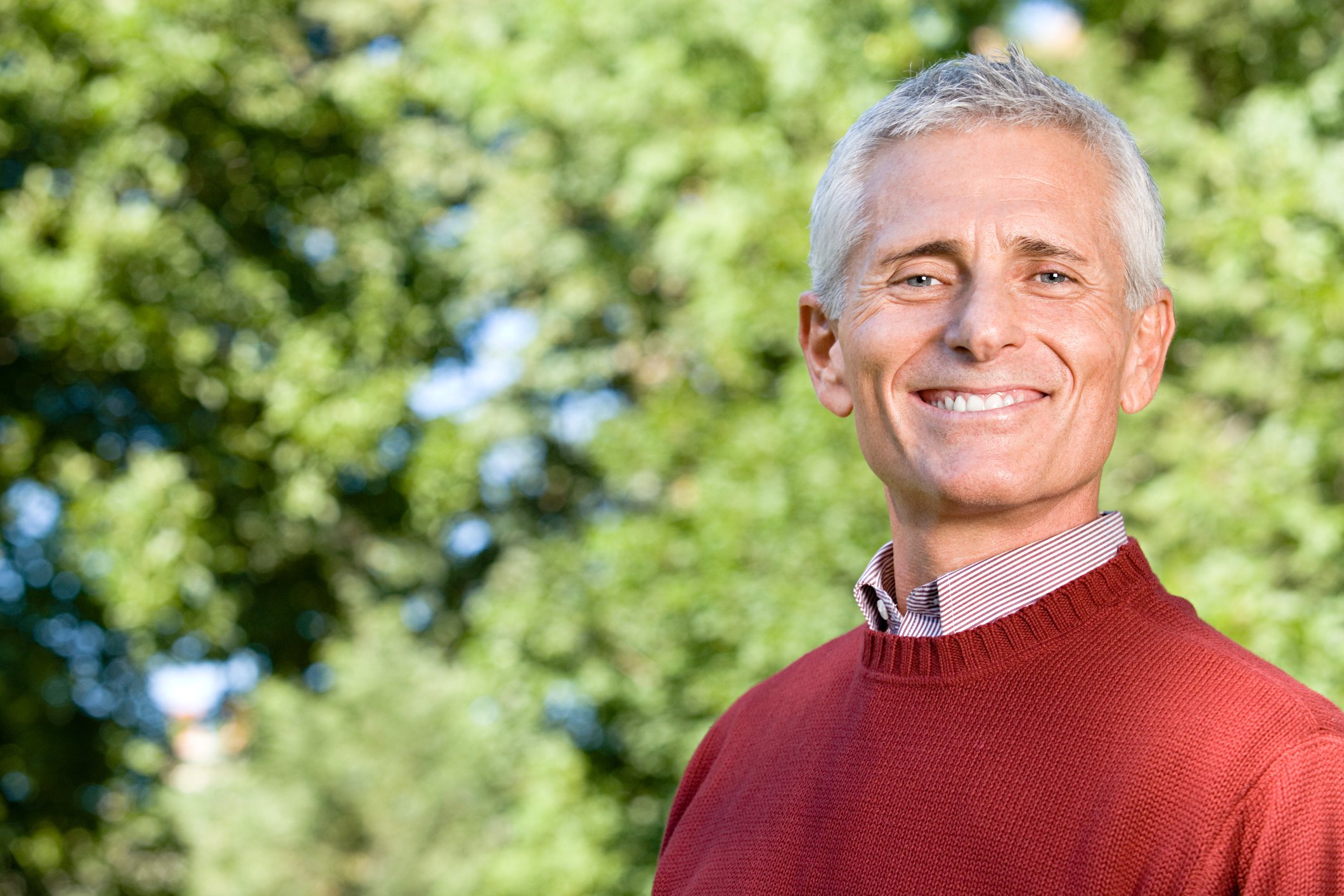 Smiling senior man outdoors