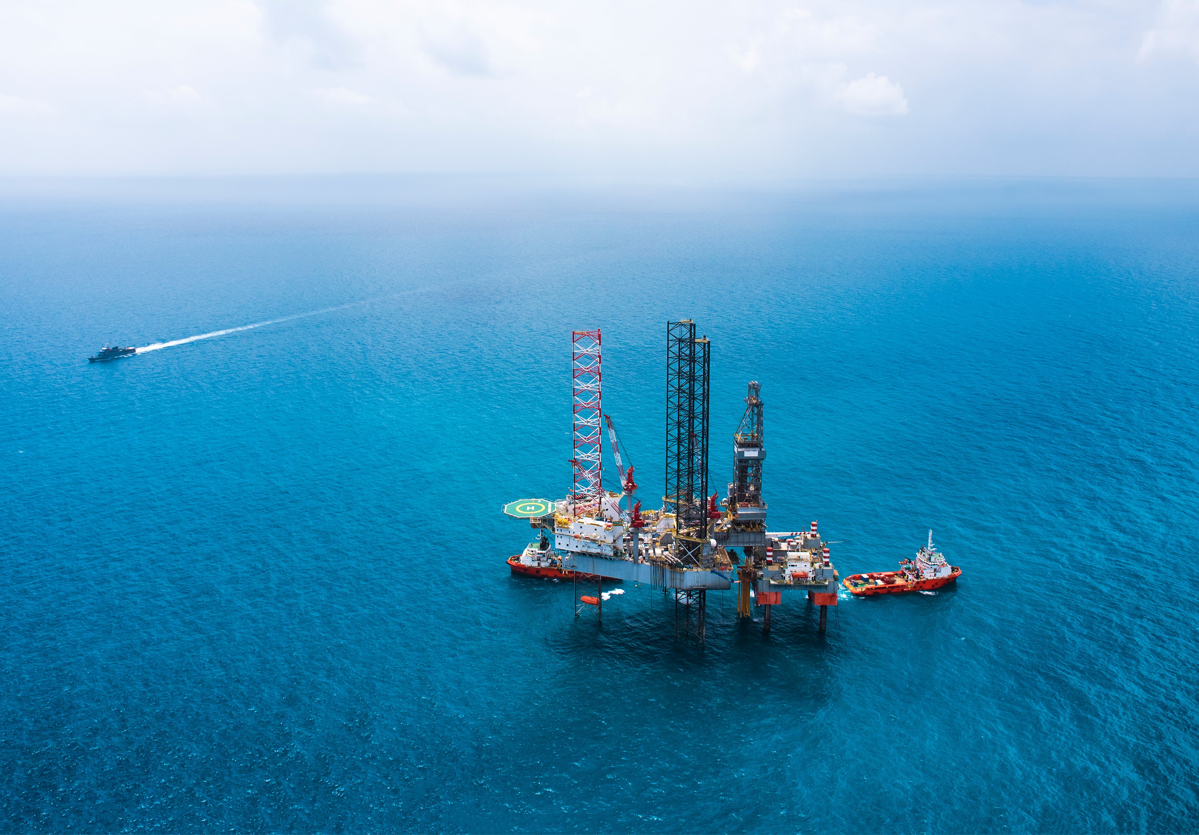 Offshore drilling rig in open water. 