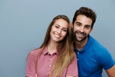 smiling young couple_GettyImages-621502402
