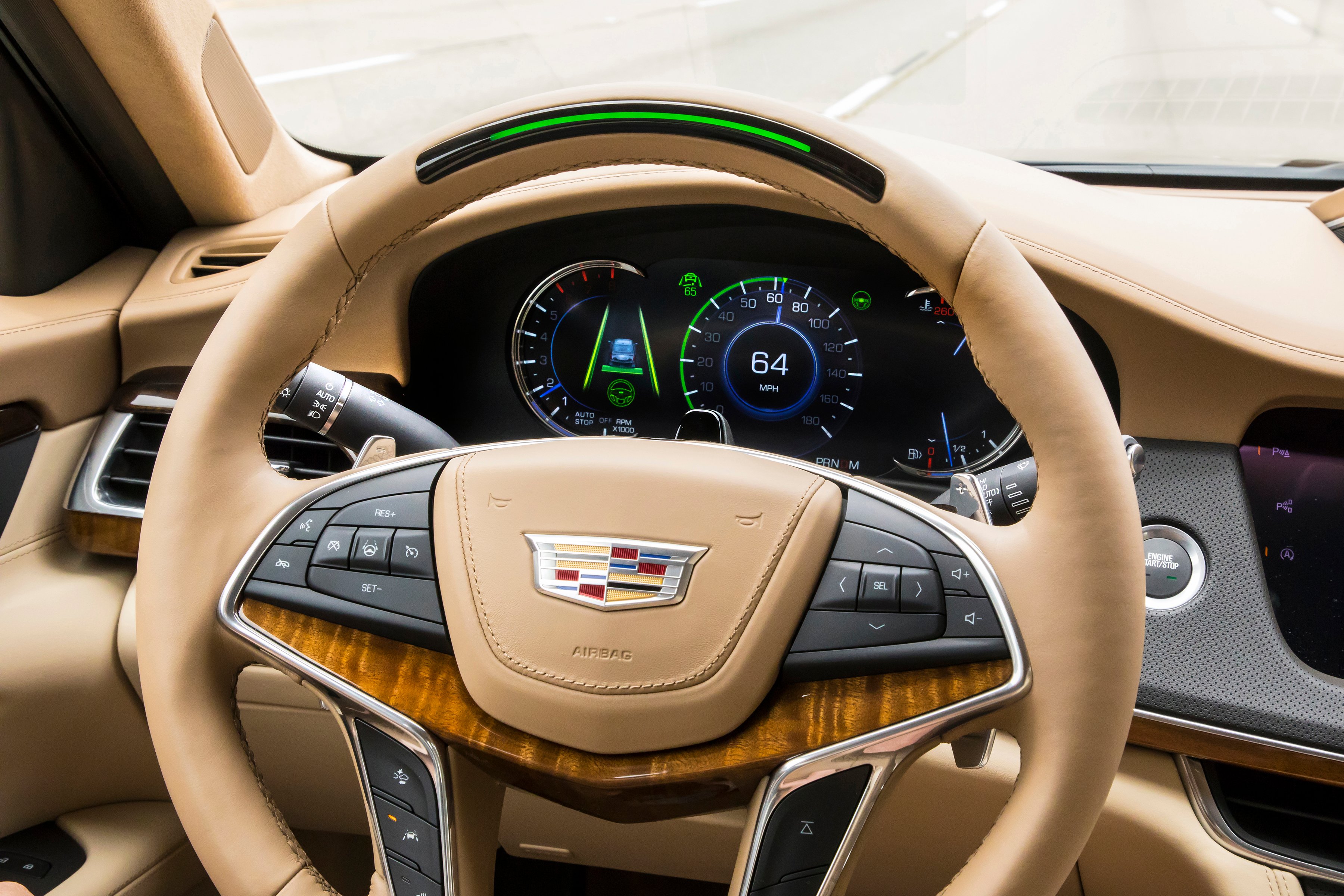 An interior view of GM's Cadillac steering wheel and display.