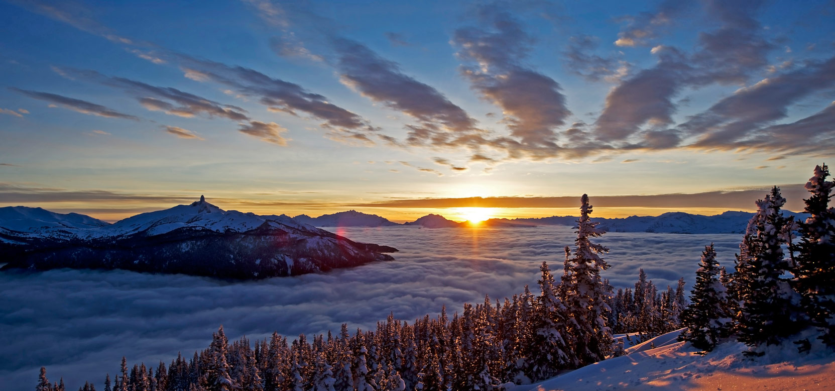 A sunrise over mountains.
