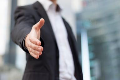 extending a handshake_GettyImages-186347725