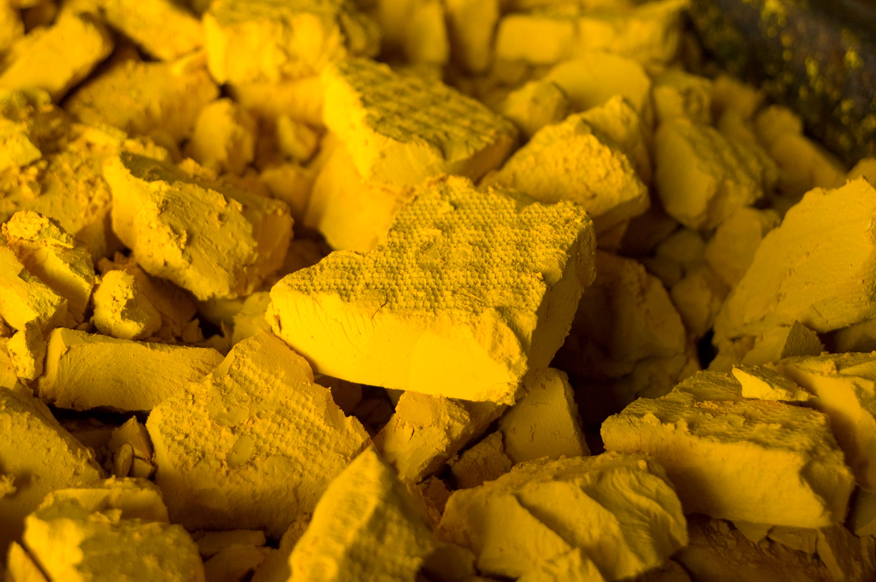 Yellow uranium rock fuel used in nuclear reactors.
