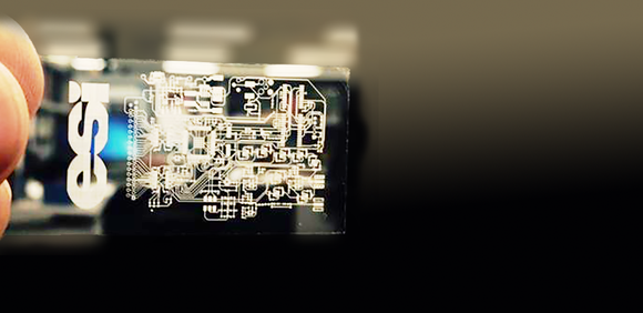 A glass substrate with the Electo Scientific Industries logo.