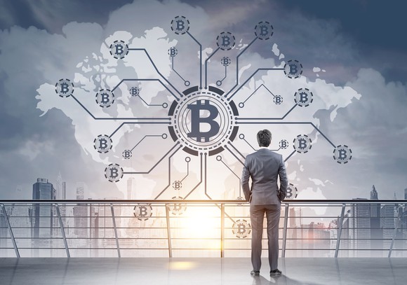 Businessman looking at a bitcoin network