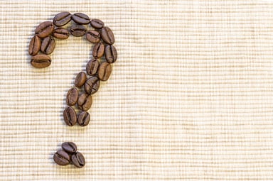 Coffee beans in a quesion mark