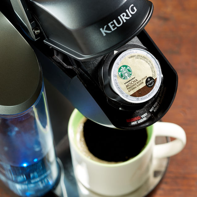 A Starbucks K-Cup pod in a Keurig machine