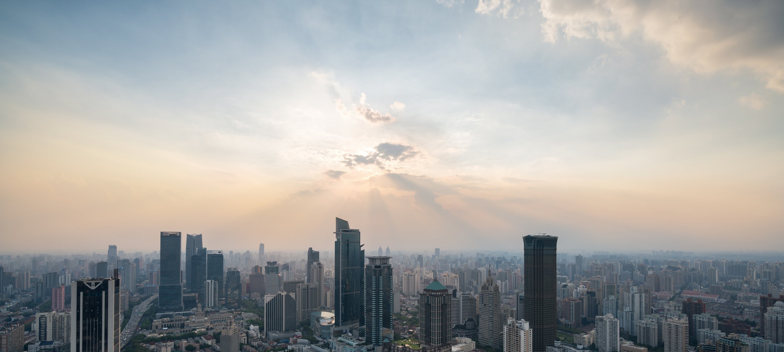 sunset above shanghai city