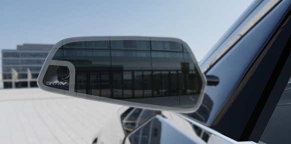 Gentex auto-dimming mirror on the driver's side of a car