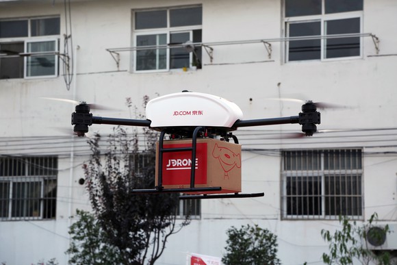 A drone carrying a package from JD.com