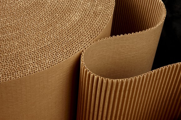 Roll of brown paper corrugation. 