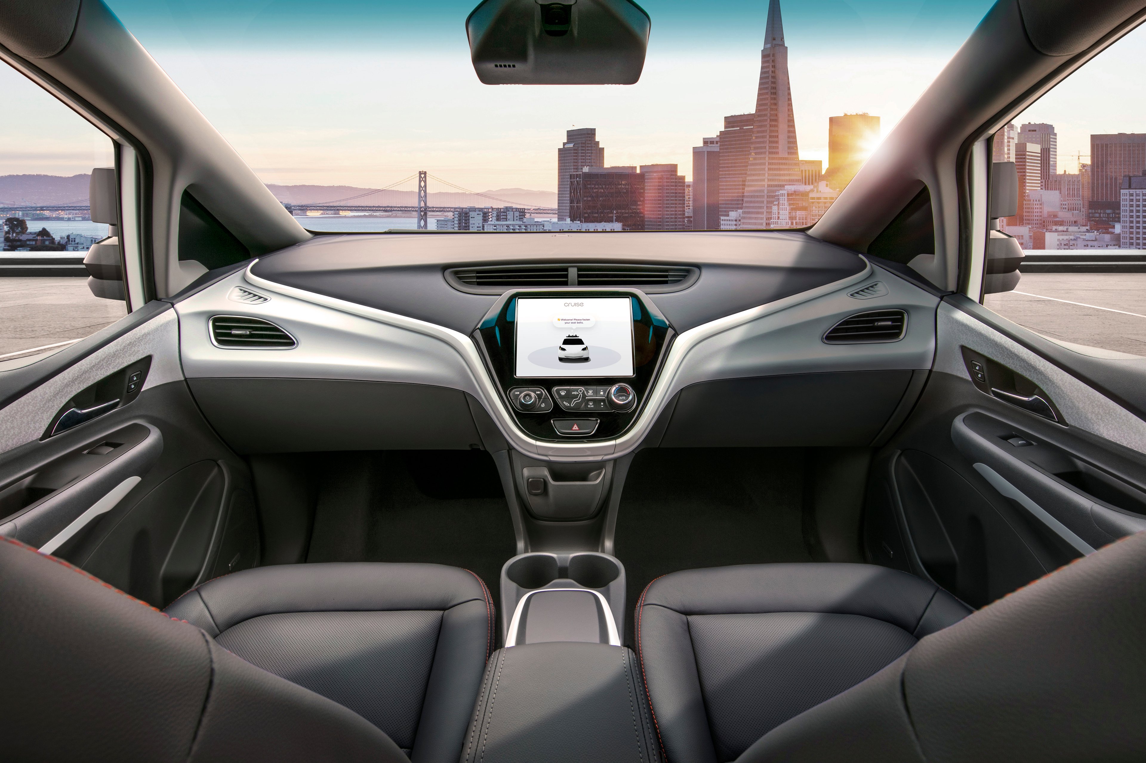 The interior of the Cruise AV, which doesn't have a steering wheel.