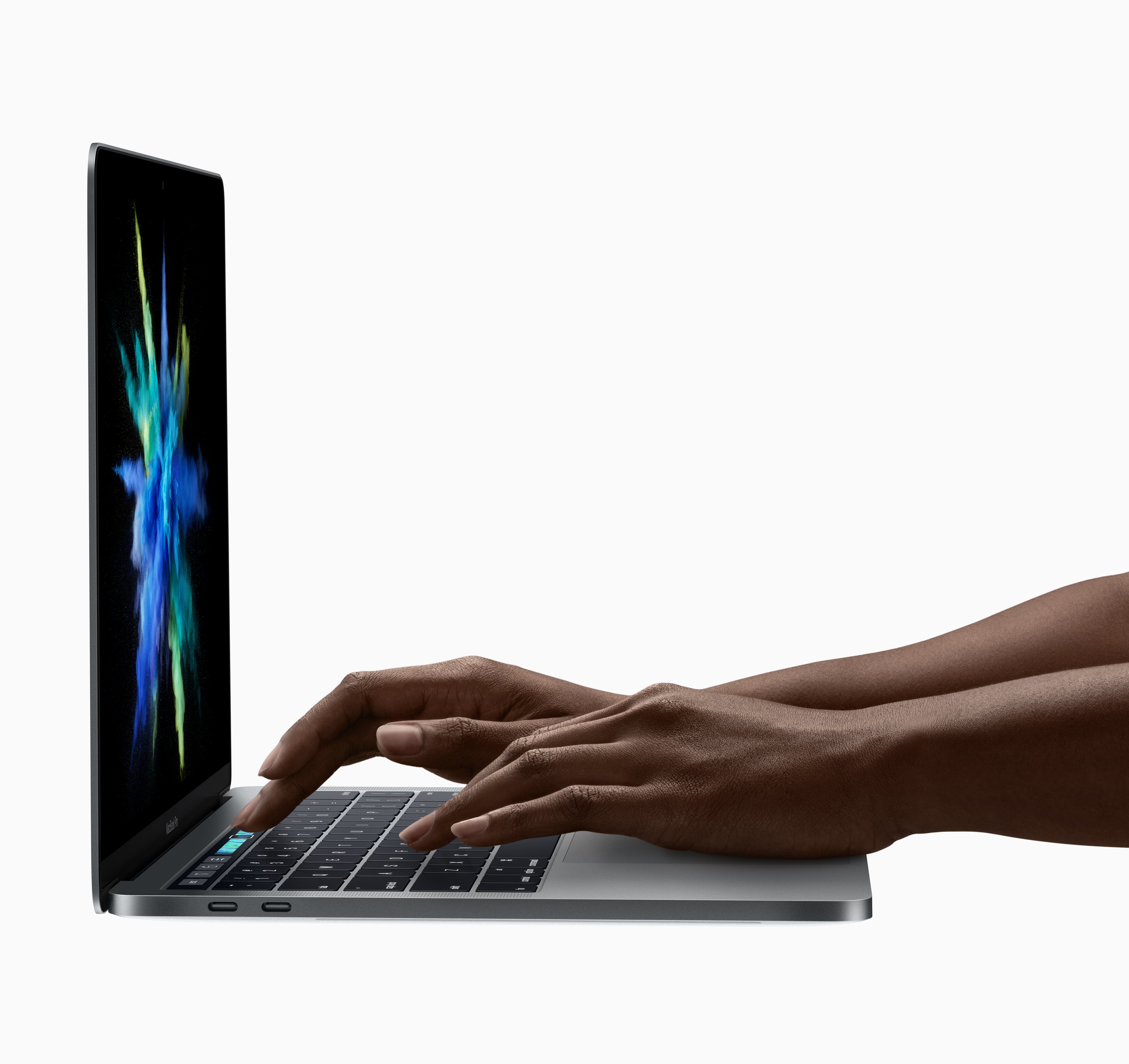 A person using Apple's redesigned MacBook Pro
