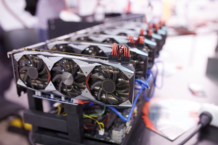 A row of cryptocurrency miners.