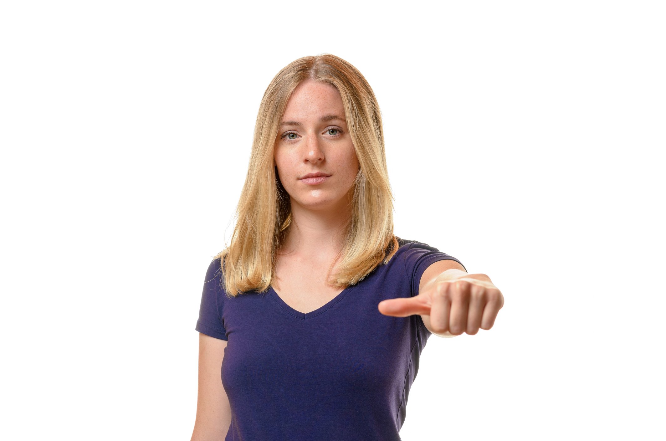 Woman holding thumb sideways