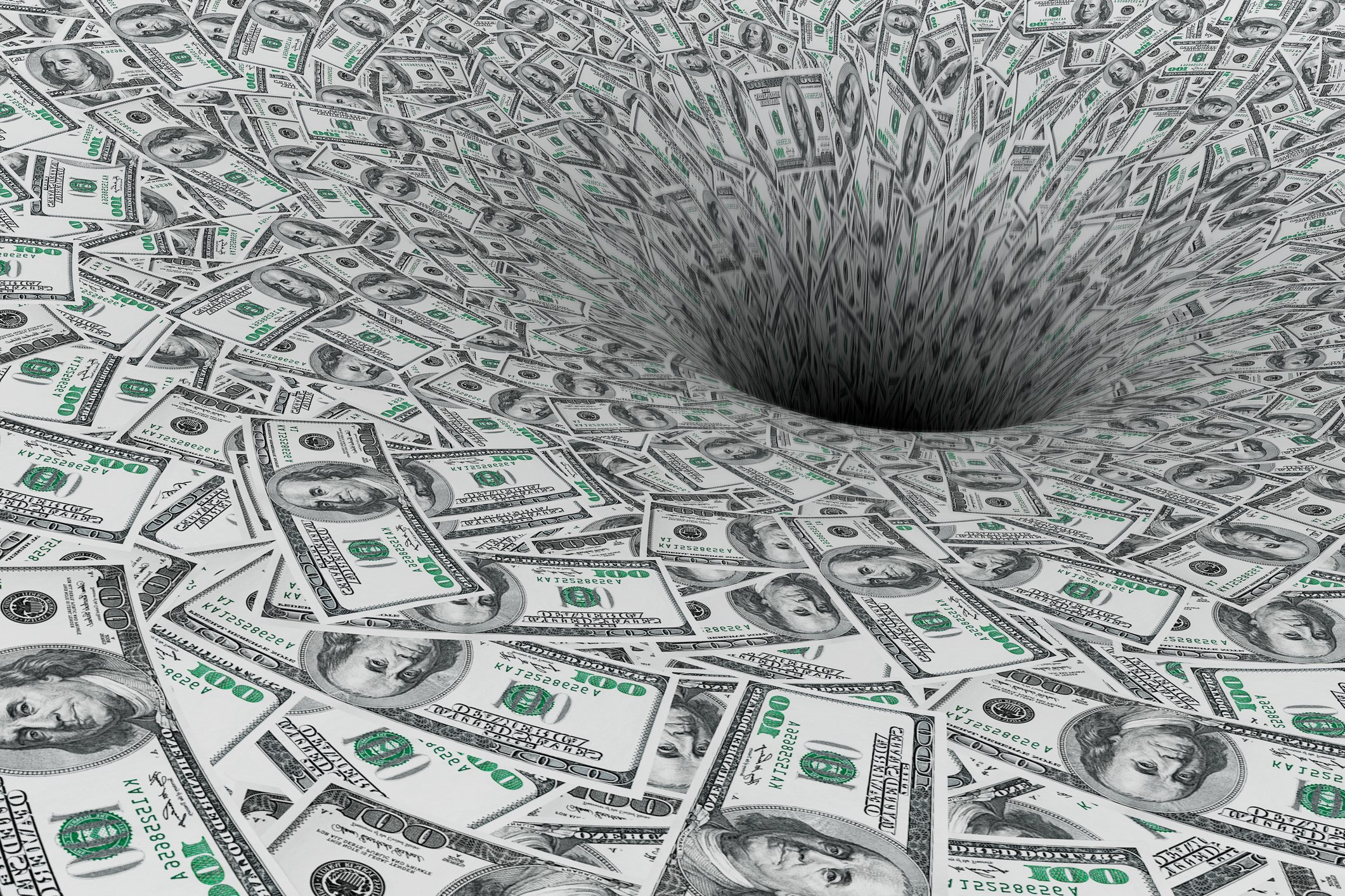 A huge expanse of hundred-dollar bills flowing down a sinkhole.
