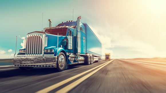a render image of truck on the road