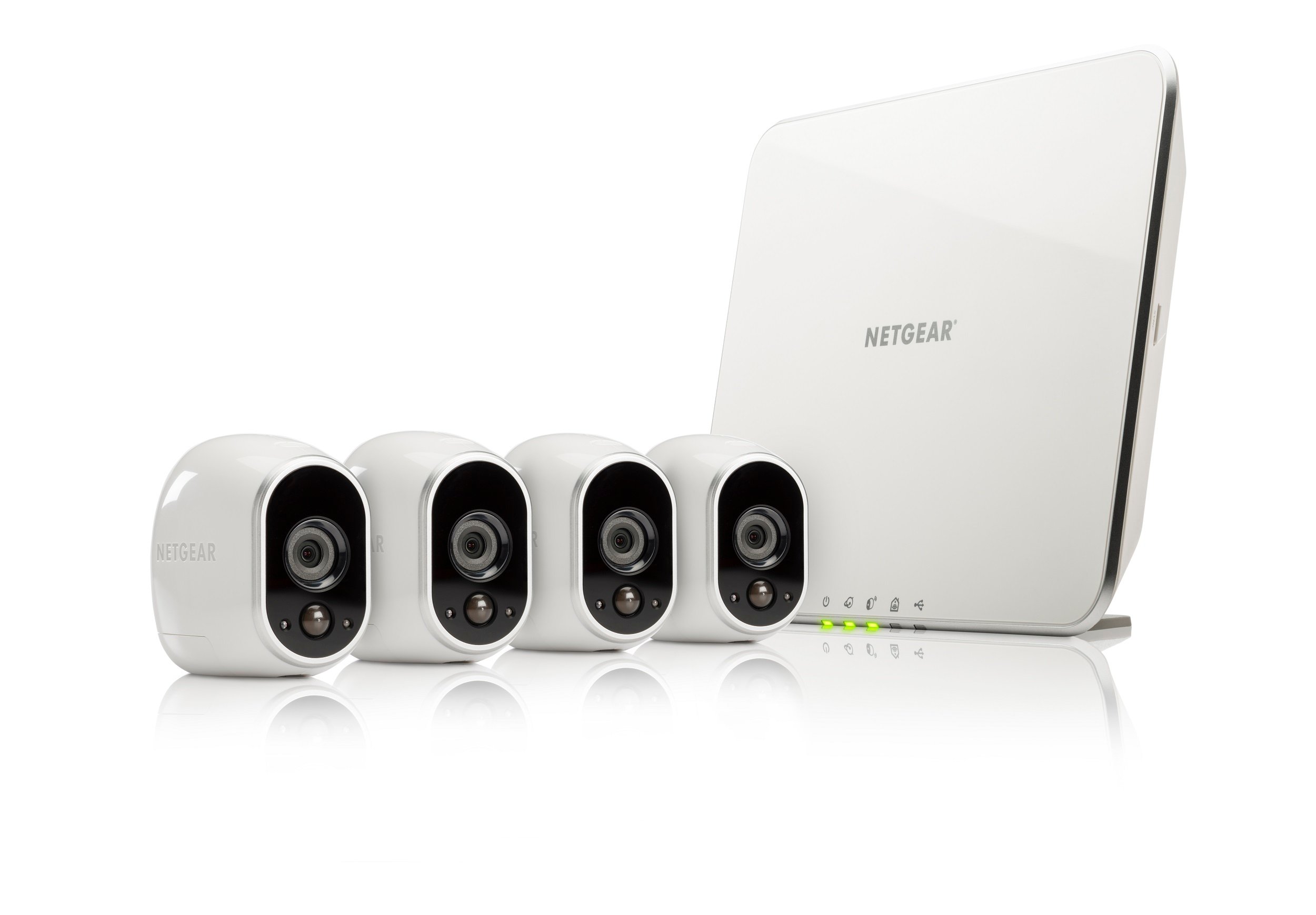 Netgear Arlo security cameras and router against a white background.