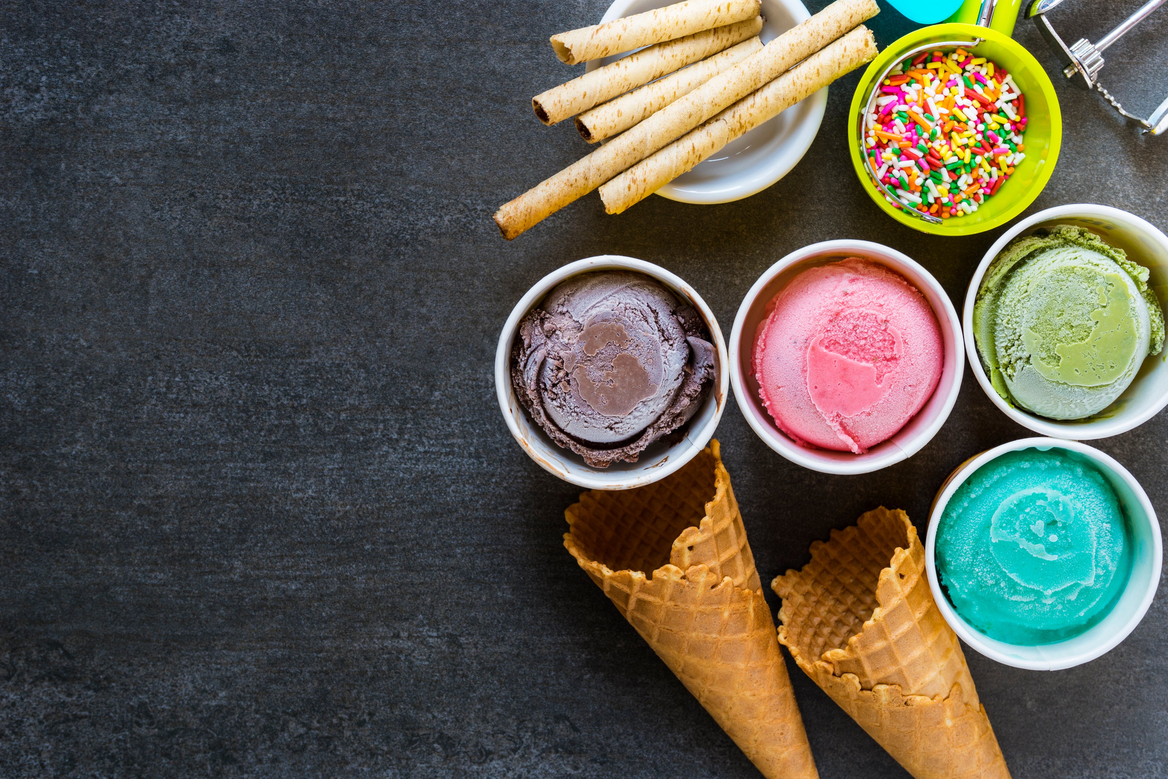 Ice cream, waffle cones, and sprinkles.