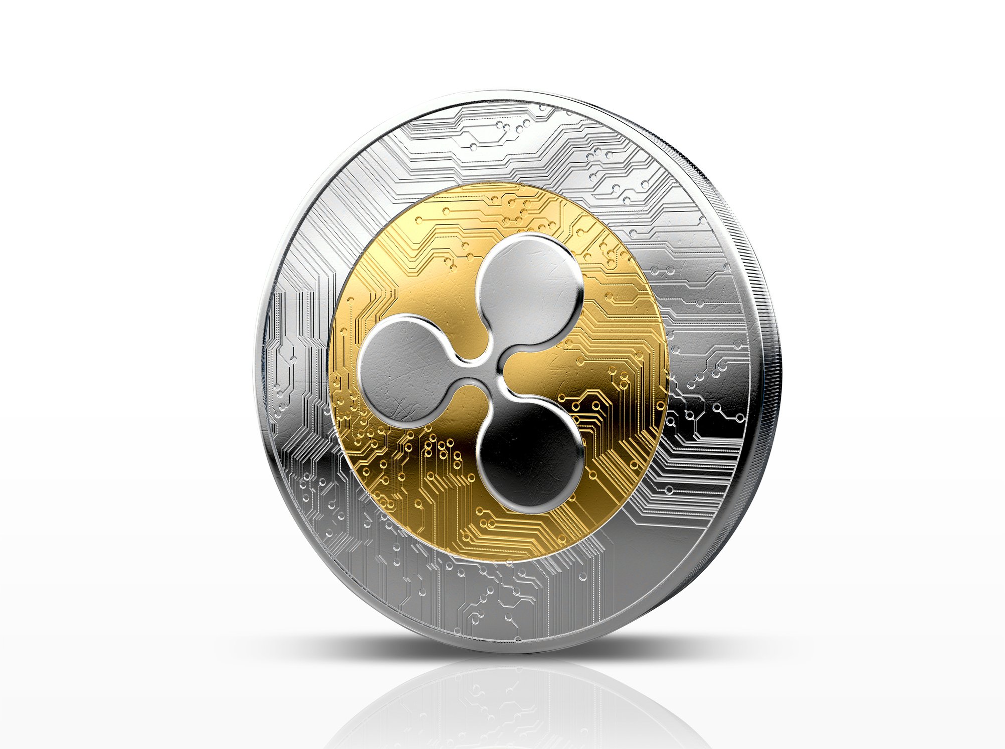 A physical coin with the Ripple logo on it.